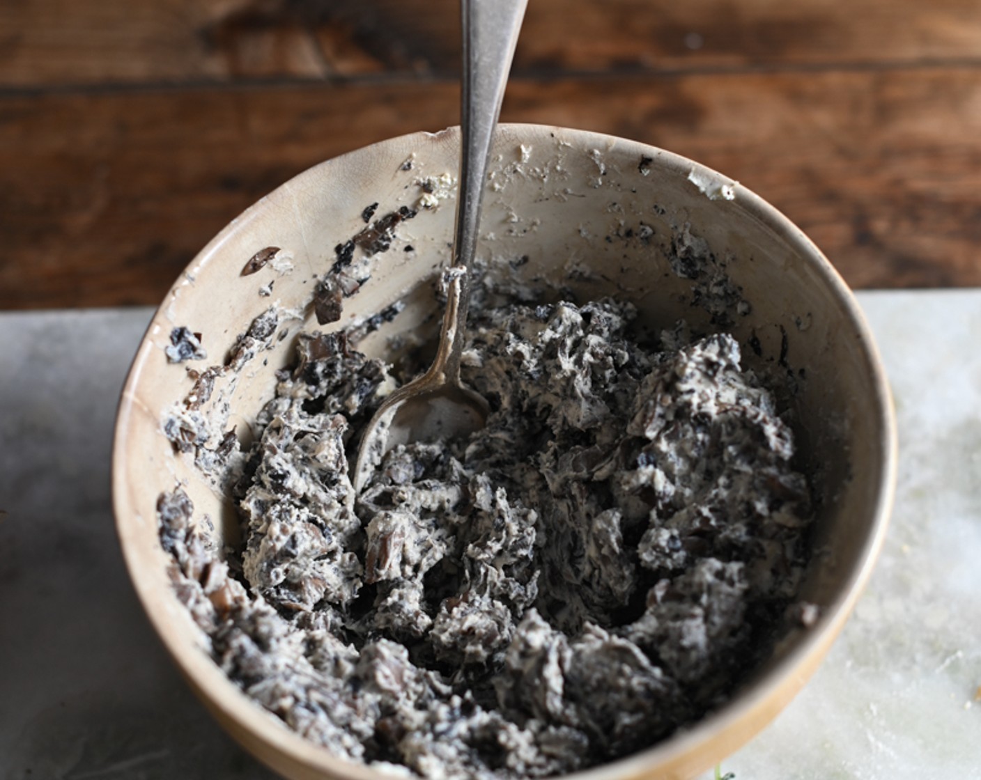 step 8 To make the filling, combine the Ricotta Cheese (1 cup) with the cooked mushrooms in a bowl. Season to taste and cover with clingfilm. Refrigerate until needed.