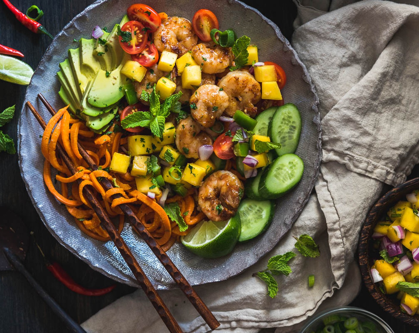 step 7 Add cooked shrimp and if desired, top with Cherry Tomatoes (to taste), Avocados (to taste), Cucumbers (to taste), or more Red Onions (to taste). Serve with the mango salsa.