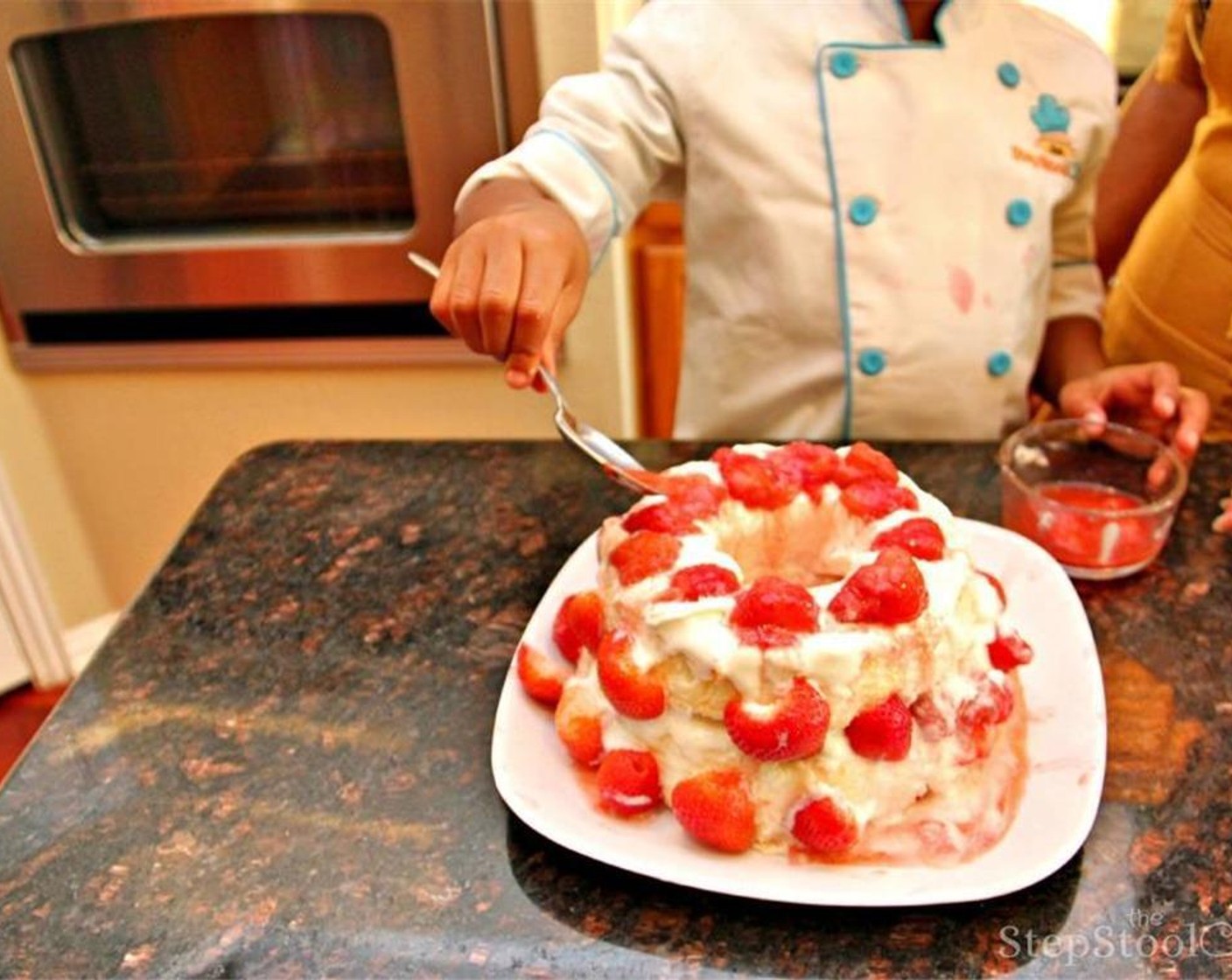 step 6 Add the second layer of cake and remaining Whipped Cream (1 1/2 cups), then both fresh and frozen strawberries on top and sides. That's it! Now it is ready to slice and serve.