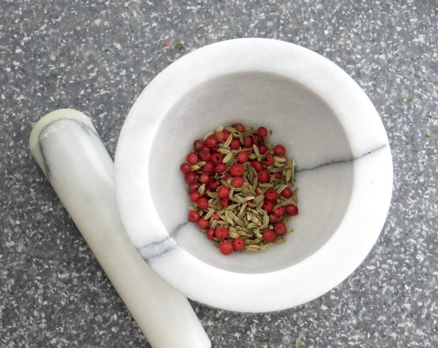 step 1 Lightly crush the Red Peppercorns (1 tsp) and Fennel Seeds (1 tsp) with a mortar with pestle. Chop Fresh Rosemary (1 Tbsp) and Fresh Thyme (1 Tbsp). Mince the Garlic (2 cloves).