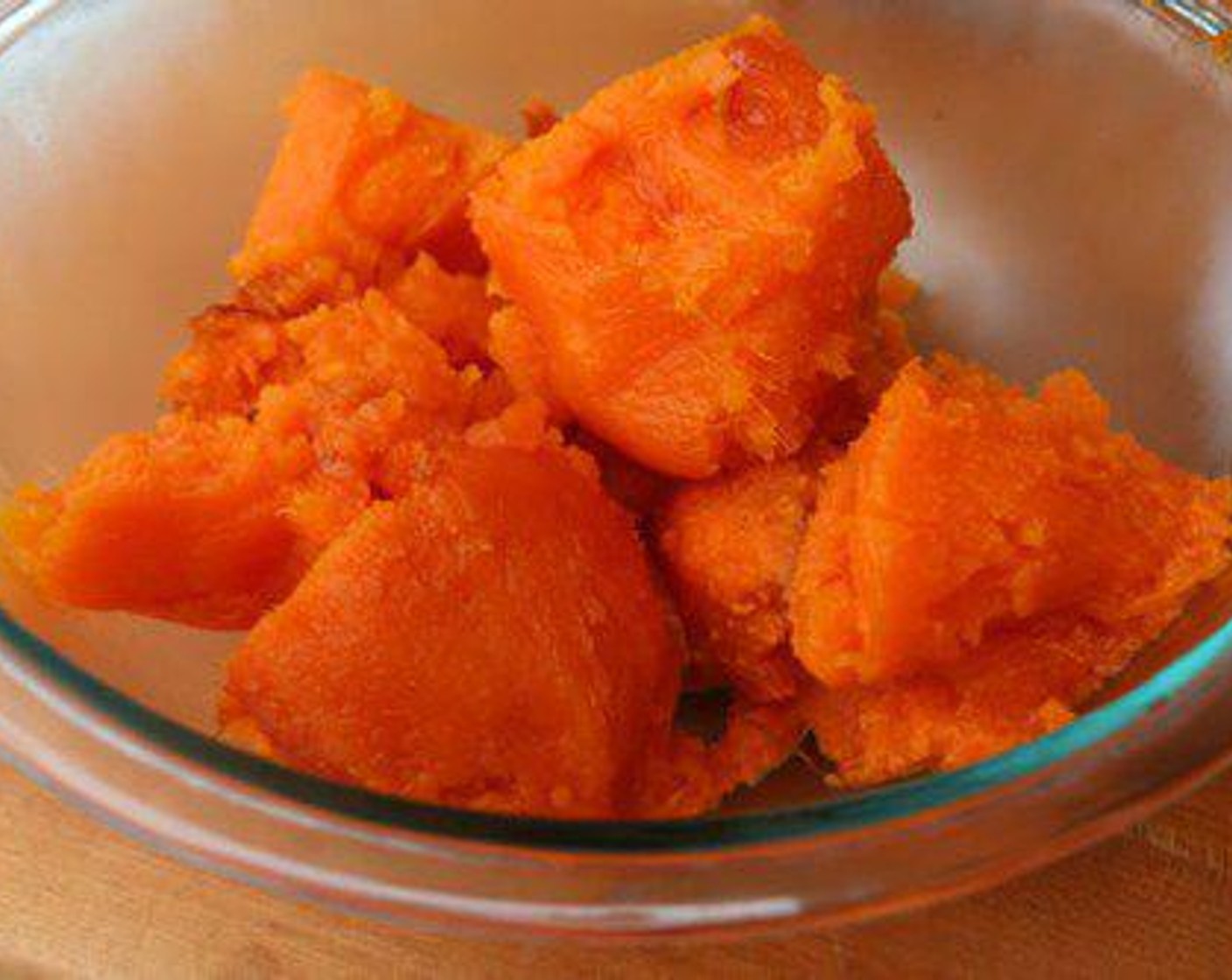 step 3 Peel sweet potatoes and place in a large bowl. Add Butter (1/2 cup), Dark Brown Sugar (1/2 cup), Heavy Cream (1/2 cup), Farmhouse Eggs® Large Brown Eggs (2), Vanilla Extract (1/2 Tbsp), Salt (1 tsp), Ground Cinnamon (1/2 tsp), Cayenne Pepper (1/8 tsp) and stir to combine. Spoon into cast iron skillet.