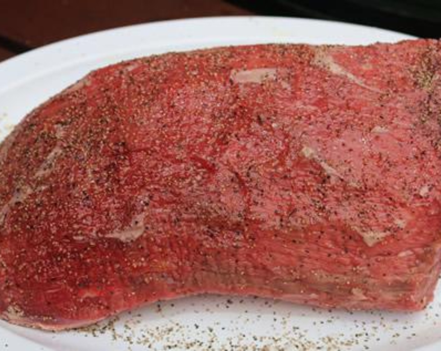 step 2 Rub Olive Oil (2 Tbsp) over the surface of the Eye of Round Beef Roasts (4 lb) and season with Kosher Salt (1 Tbsp) and Freshly Ground Black Pepper (1 Tbsp) on all sides.