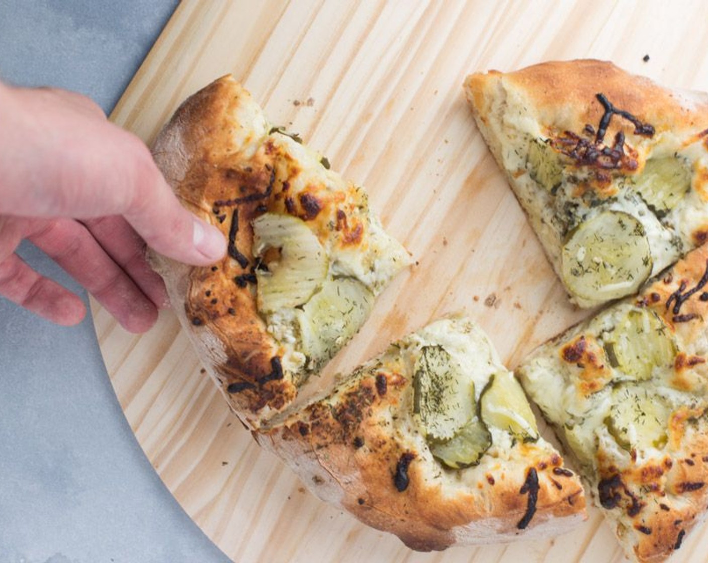 step 8 Carefully transfer the pie onto baking stone inside the oven by sliding it off your peel/sheet. Reduce oven temperature to 500 degrees F (260 degrees C) and bake for 10-12 minutes, or until golden brown on the crust. Serve warm.