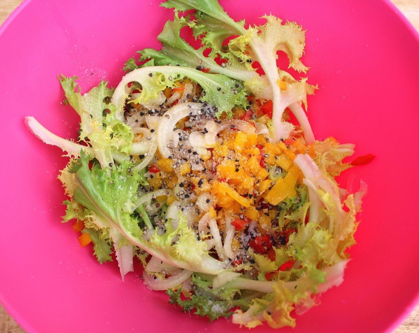 step 3 Into a large mixing bowl, add the couscous, Curly Endive (to taste), Assorted Color Bell Peppers (1/2 cup), Sweet Onion (1/2), 2 Tbsp of Lemon Juice, Extra-Virgin Olive Oil (4 Tbsp), Kosher Salt (to taste), and Freshly Ground Black Pepper (to taste).