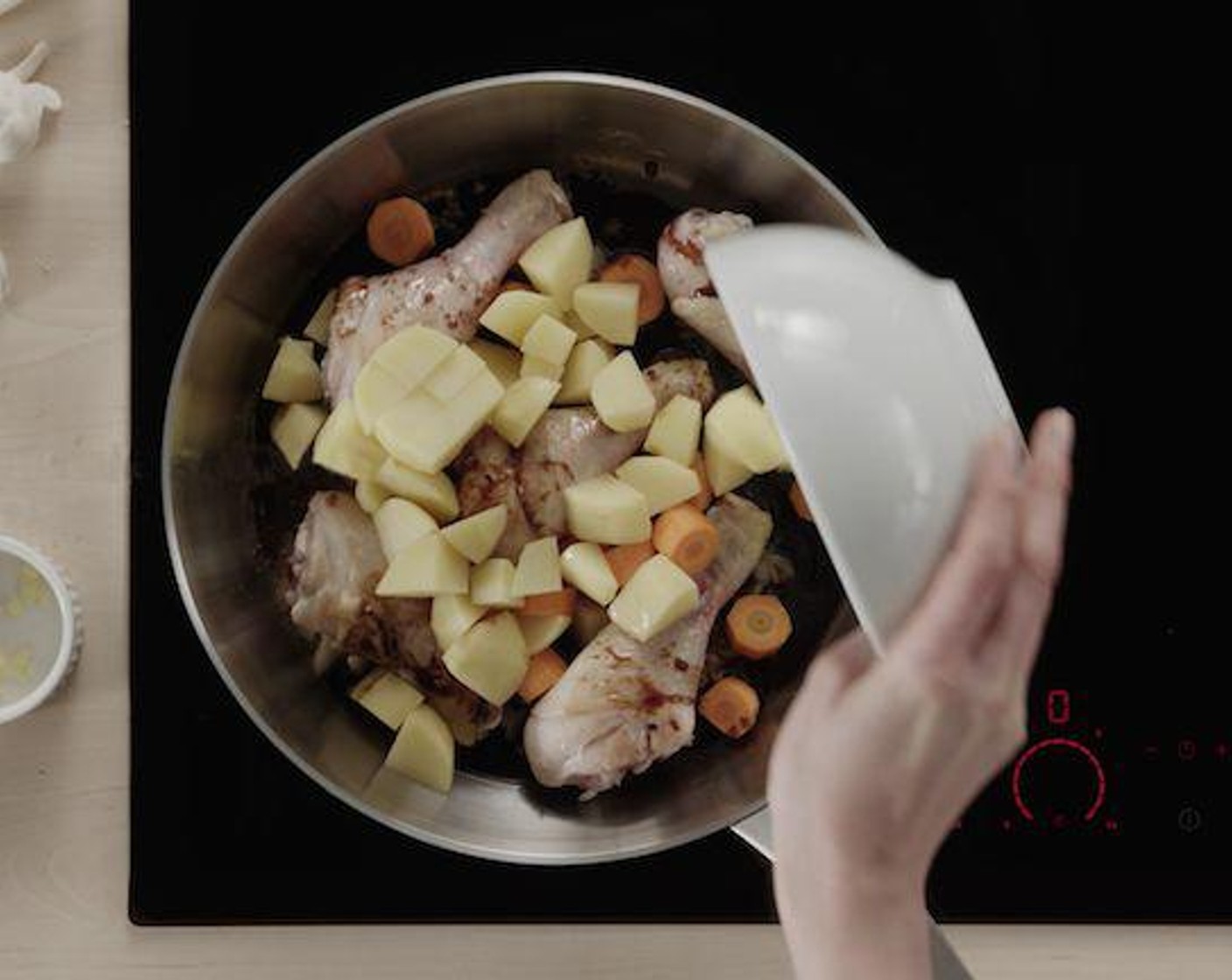 step 6 Peel Carrots (2), Onion (1), and Potatoes (3) and cut into 1-inch cubes and gently stir in.