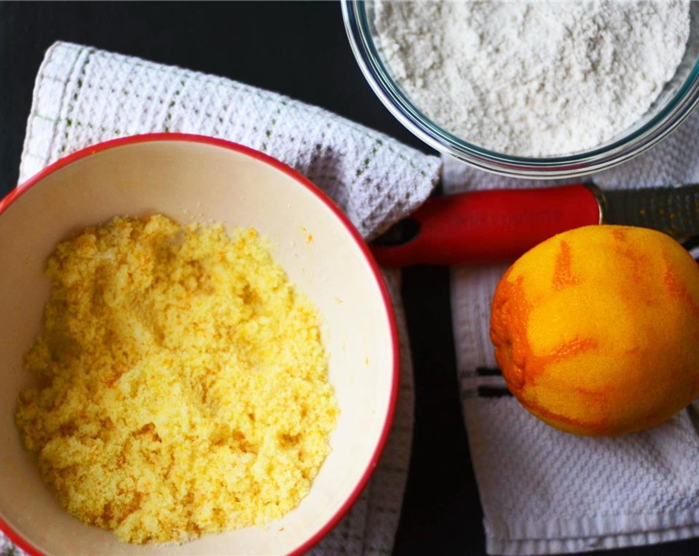 step 3 Combine zest from Orange (1) and Granulated Sugar (1 cup) in a large mixing bowl, and using your fingers, rub the zest into the sugar.