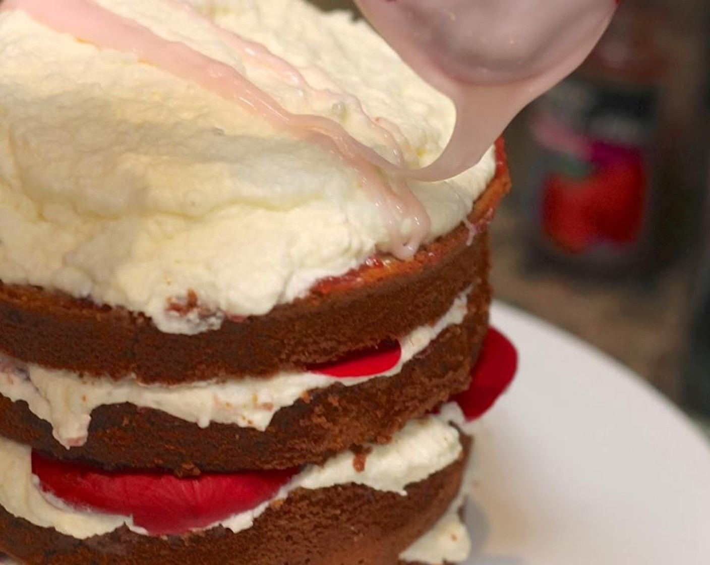 step 14 Drizzle Rosewater icing over the top of the cake.