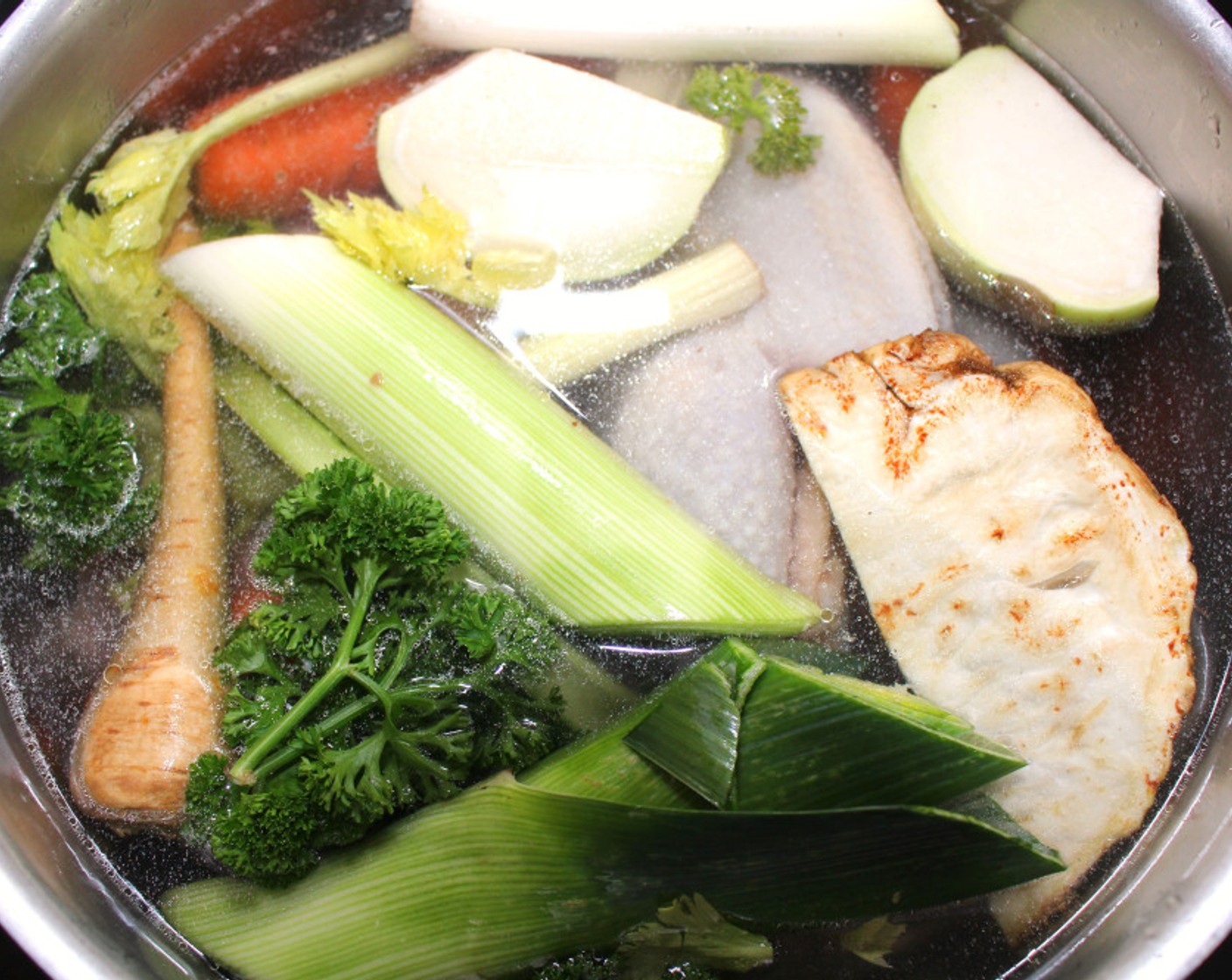 step 1 Simmer the Whole Chicken (1), Chicken Back (2 lb), and Mixed Vegetables (9 cups) in lightly salted Water (40 cups) for 2 hours. The stock will reduce to about 2-3 quarts, so take it very easy with the salt at this time.