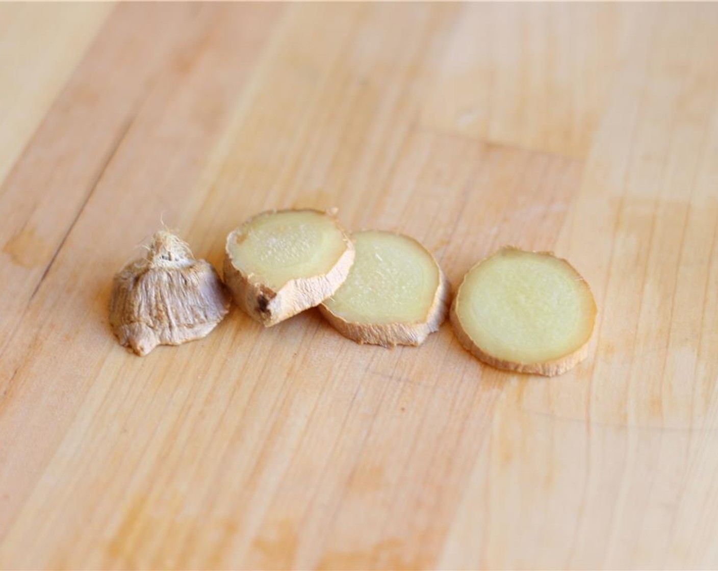 step 2 Slice the Fresh Ginger (1 piece).