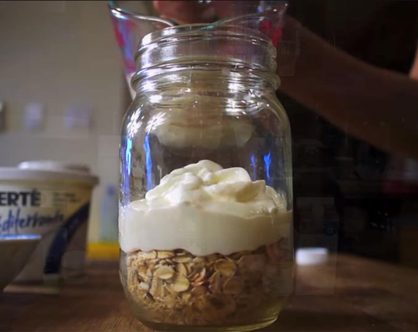 step 1 In a jar, or any container with a lid, add the Raw Old Fashioned Rolled Oats (1/2 cup), Plain Yogurt (1/2 cup), Almond Milk (2/3 cup), Honey (1 Tbsp), Ground Cinnamon (1/4 tsp), Vanilla Extract (1/4 tsp), and Salt (1 pinch) Put lid on, and shake to mix well.