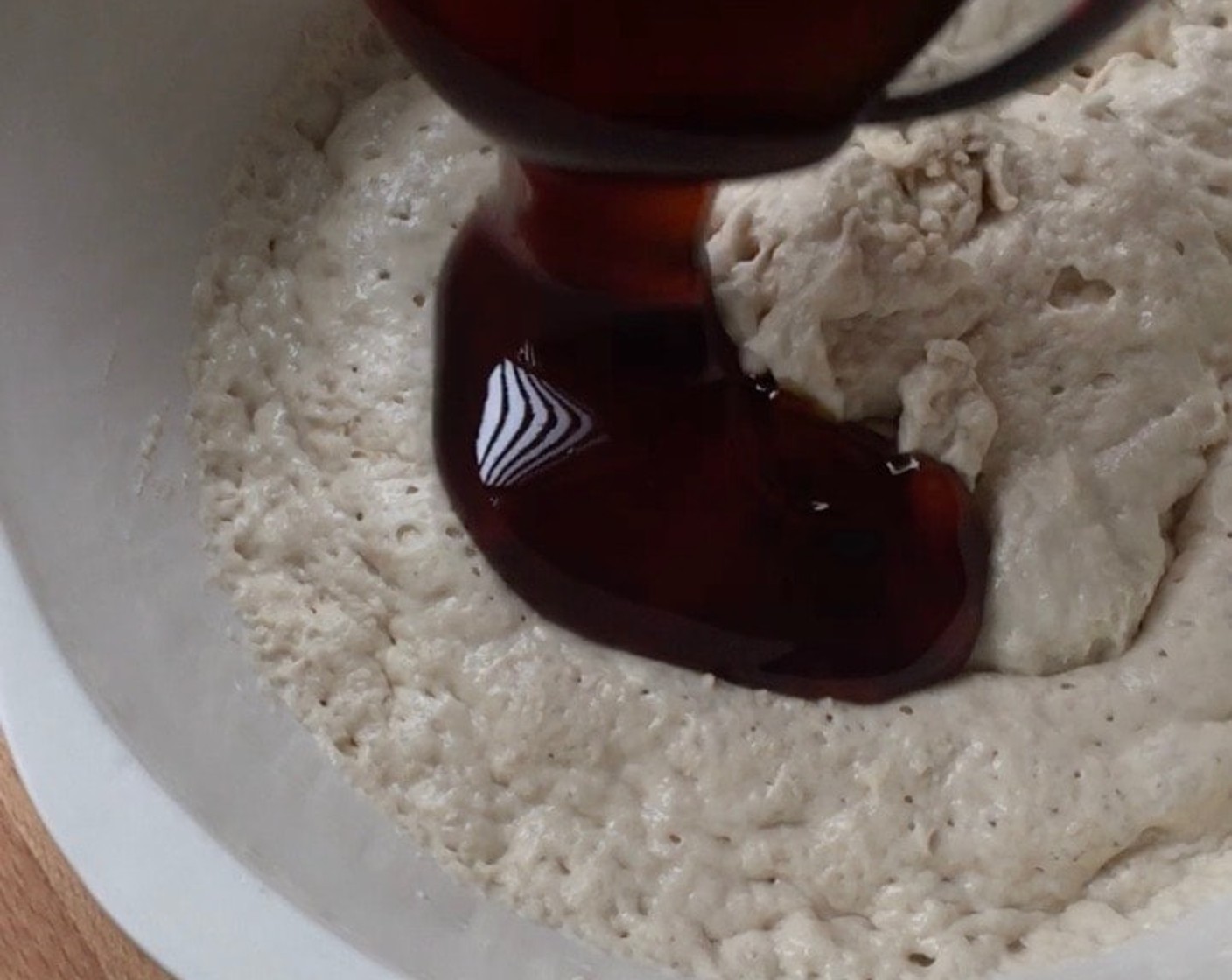 step 13 In a mixing bowl, add palm sugar syrup and flour mixture into the fermented yeast mixture.