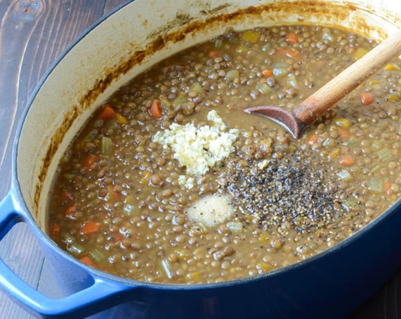 step 7 Simmer, stirring occasionally with the lid slightly askew for another 15-20 minutes until the beans are quite tender and the broth thickens.