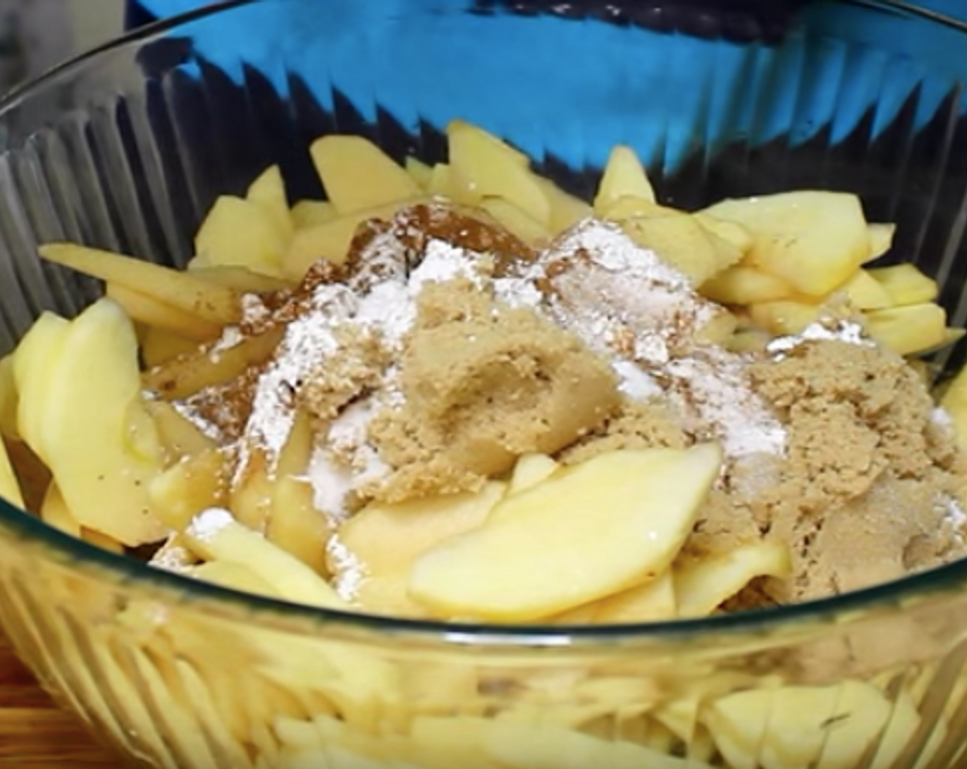 step 6 Add Apples (11 cups), Simply Organic Cinnamon, Ground (1 tsp), Ground Nutmeg (1/4 tsp), Corn Starch (3 Tbsp), Caster Sugar (1/3 cup), Brown Sugar (1/3 cup), and Lemon (1/2) juice. Use fingers and hands to make it mix all together.