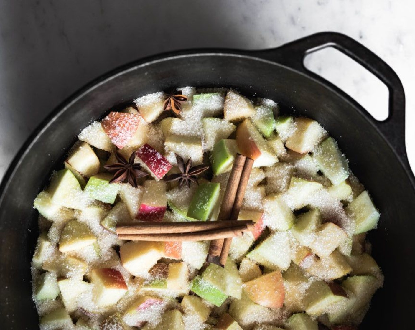 step 1 Add Apples (11 cups) pieces to a pot along with Water (1 cup) (or apple cider), Granulated Sugar (1/3 cup), Cinnamon Stick (1), and Star Anise (3).