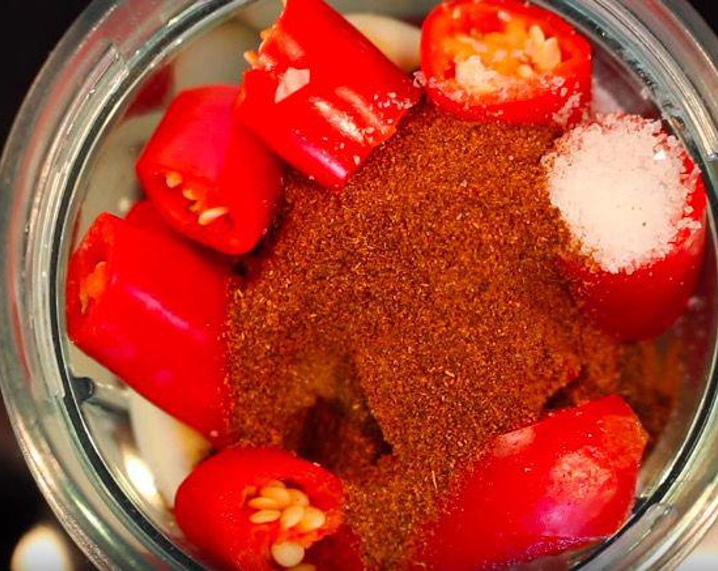 step 3 In a blender, add Red Bell Pepper (1), Garlic (4 cloves), Red Chili Peppers (4), Salt (1 tsp), Smoked Paprika (1 Tbsp), Ground Black Pepper (1/2 tsp), Distilled White Vinegar (1 Tbsp), Lemon (1), and Extra-Virgin Olive Oil (3/4 cup).