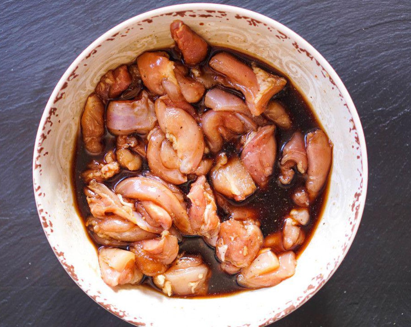 step 2 Combine the Caster Sugar (2 Tbsp) and Low-Sodium Soy Sauce (1/4 cup), and add to the chicken. Marinate in the fridge for 1 hour.