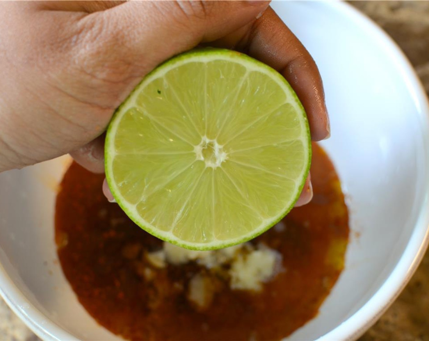 step 3 Grate the Garlic (3 cloves) and juice the Lime (1/2).
