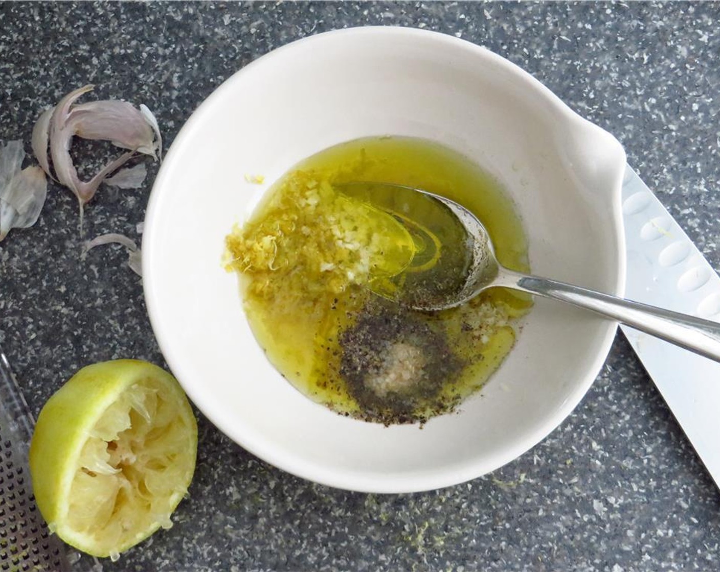 step 5 For the dressing, zest the Lemon (1) and cut lemon in half. Combine the zest and juice from half the lemon in a small bowl. Add White Wine Vinegar (1 Tbsp), Olive Oil (4 Tbsp), tarragon, and mint. Whisk to combine. Season with Salt (to taste) and Ground Black Pepper (to taste).