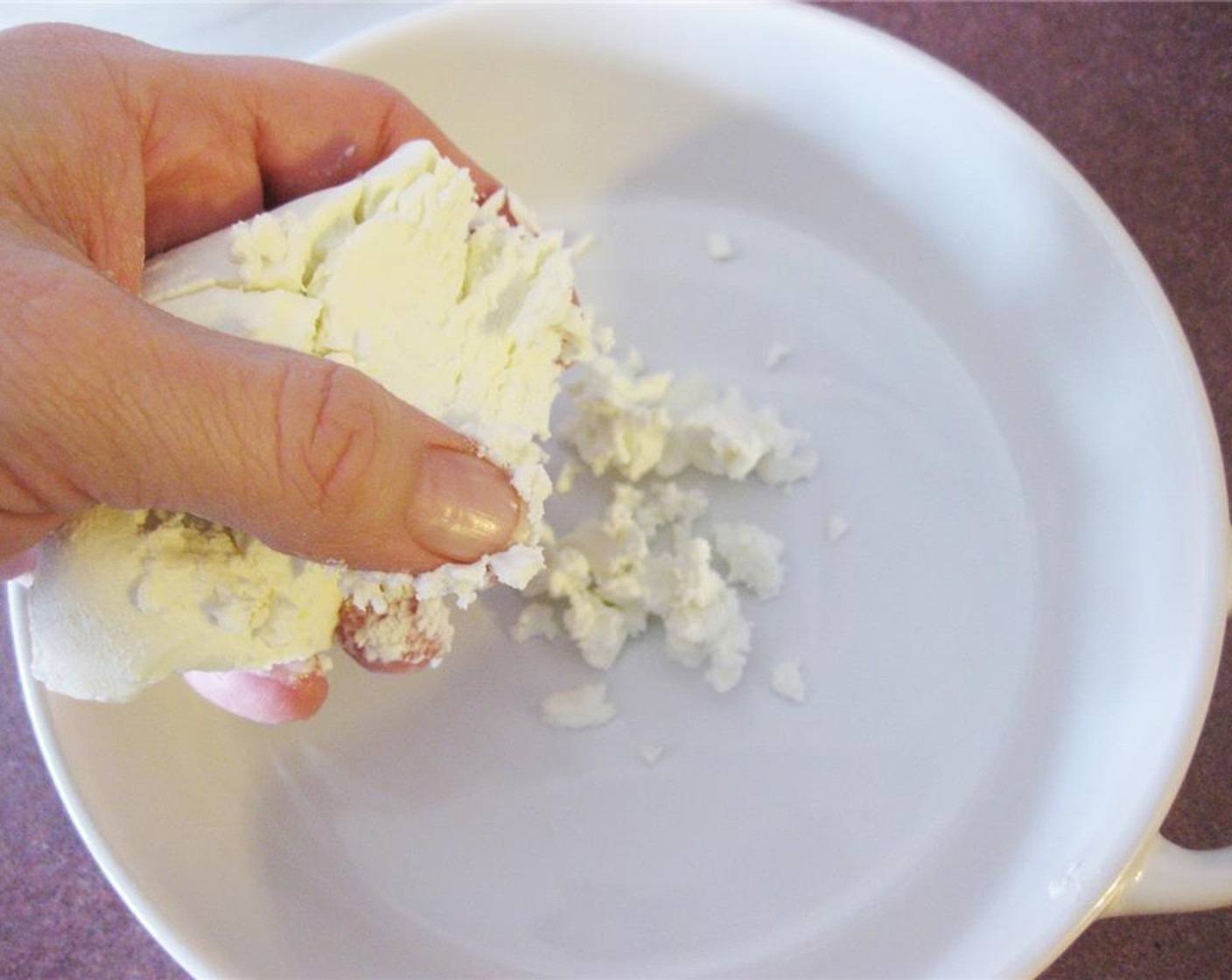 step 2 Crumble the Aged Goat Cheese (to taste).