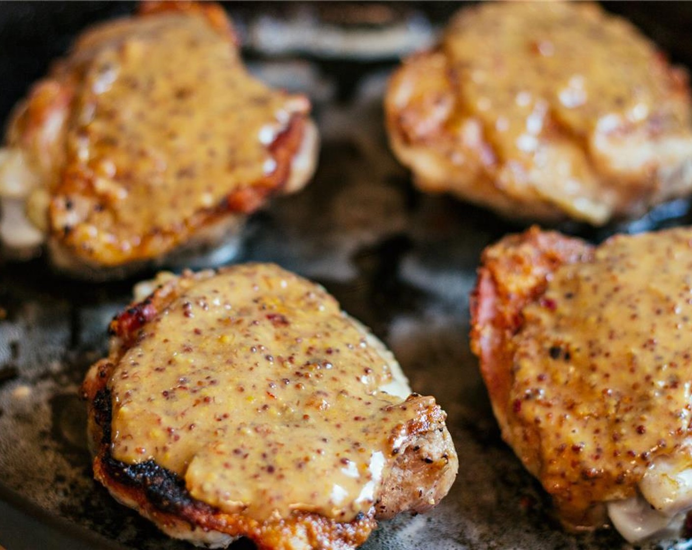 step 7 Flip the chicken over and drizzle with half the honey mustard.