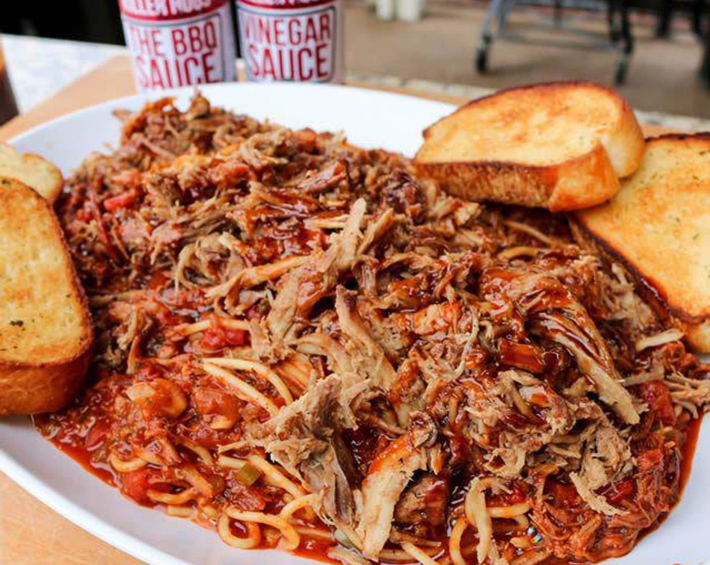 step 4 Remove pasta from heat and pour sauce over pasta. Toss gently to combine and place on large serving platter. Top with remaining Pulled Pork (1.5 lb) and drizzle with additional BBQ sauce.