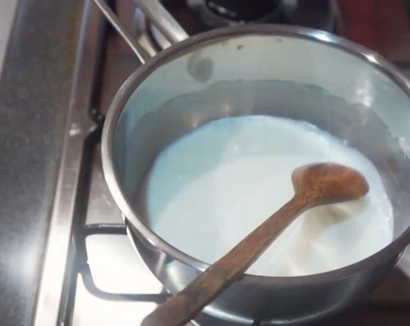 step 5 In a pot, bring the remaining portion of Milk (1/3 cup) to a simmer.