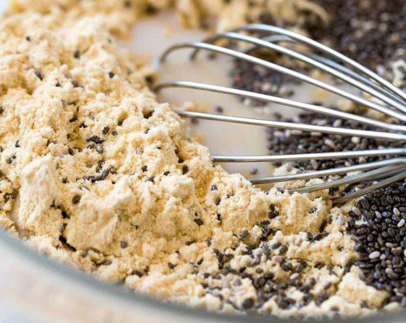 step 1 In a medium sized bowl whisk together Vanilla Protein Powder (3/4 cup), Unsweetened Almond Milk (2 1/2 cups), and Chia Seeds (4 Tbsp).