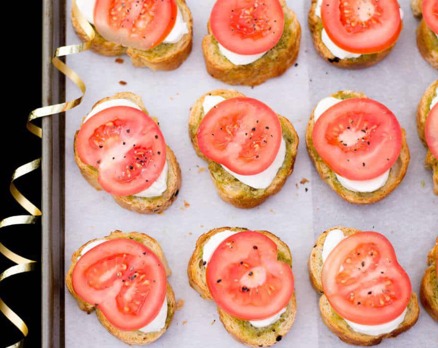 Tomato Mozzarella Pesto Crostini