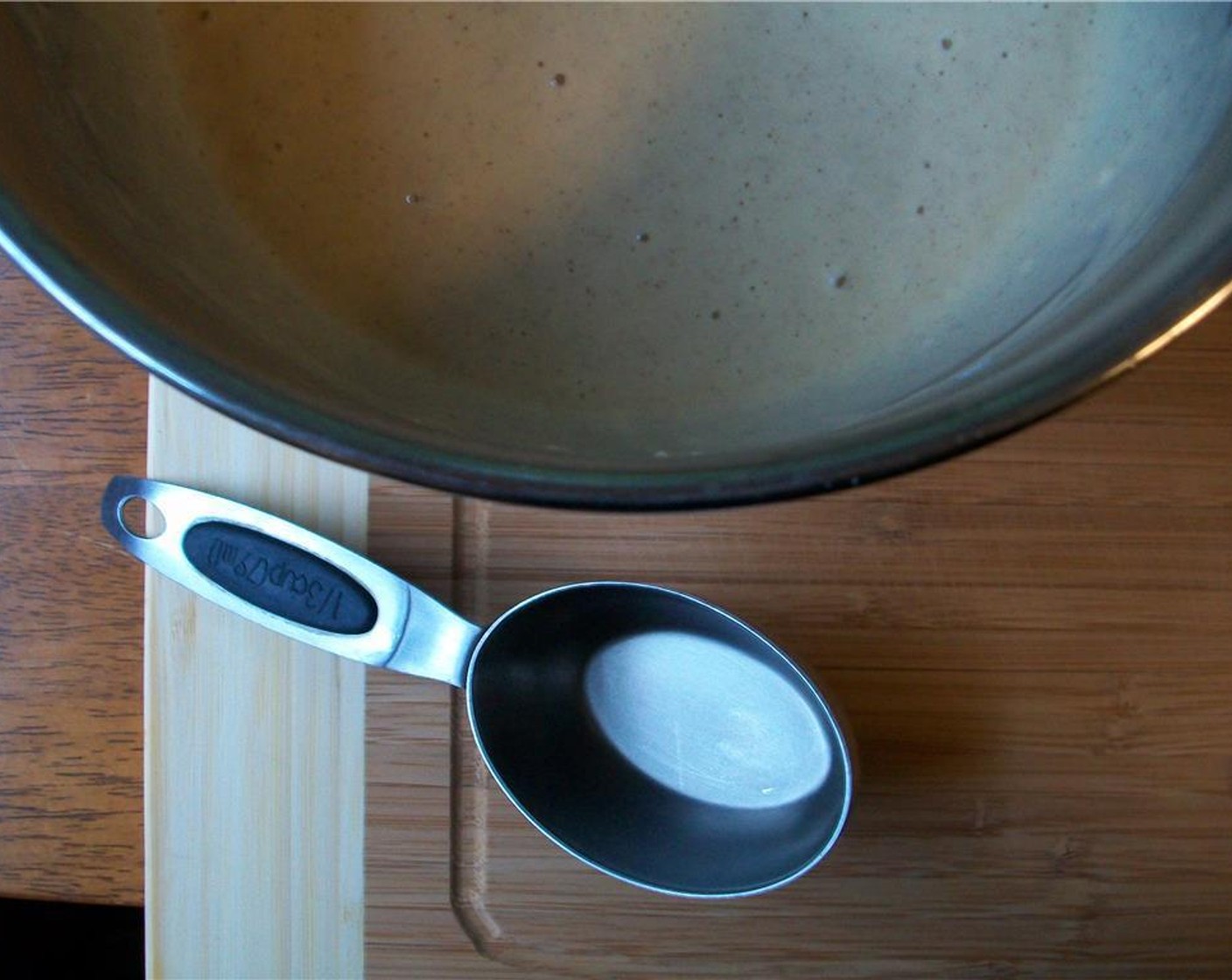 step 3 Heat a skillet on medium high and add grease the pan with some butter. Use a 1/3 cup measuring cup to portion and drop batter into the pan.