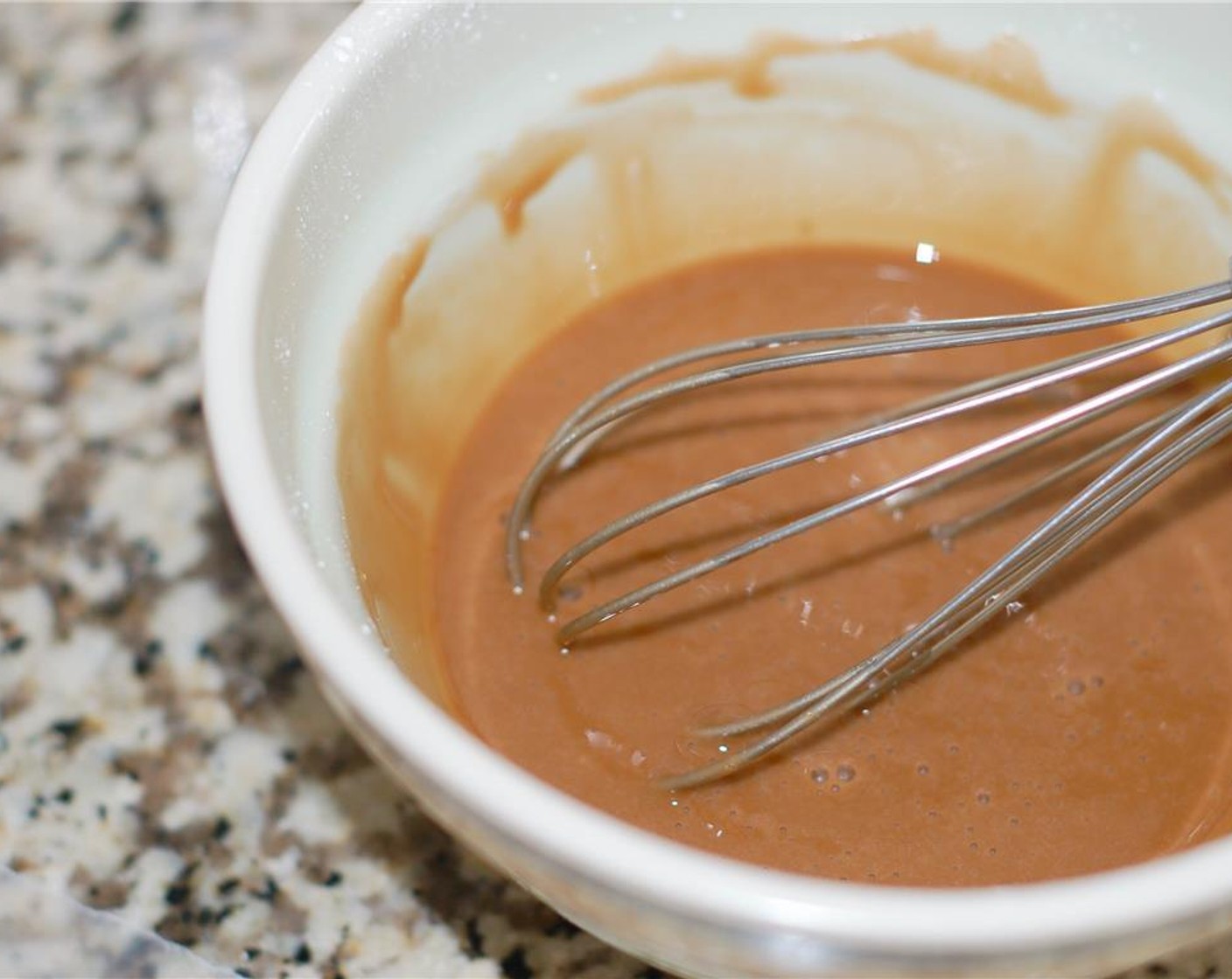 step 8 In a small bowl, whisk together Powdered Confectioners Sugar (1 cup), Milk (2 Tbsp), and Maple Extract (1 tsp) until smooth.