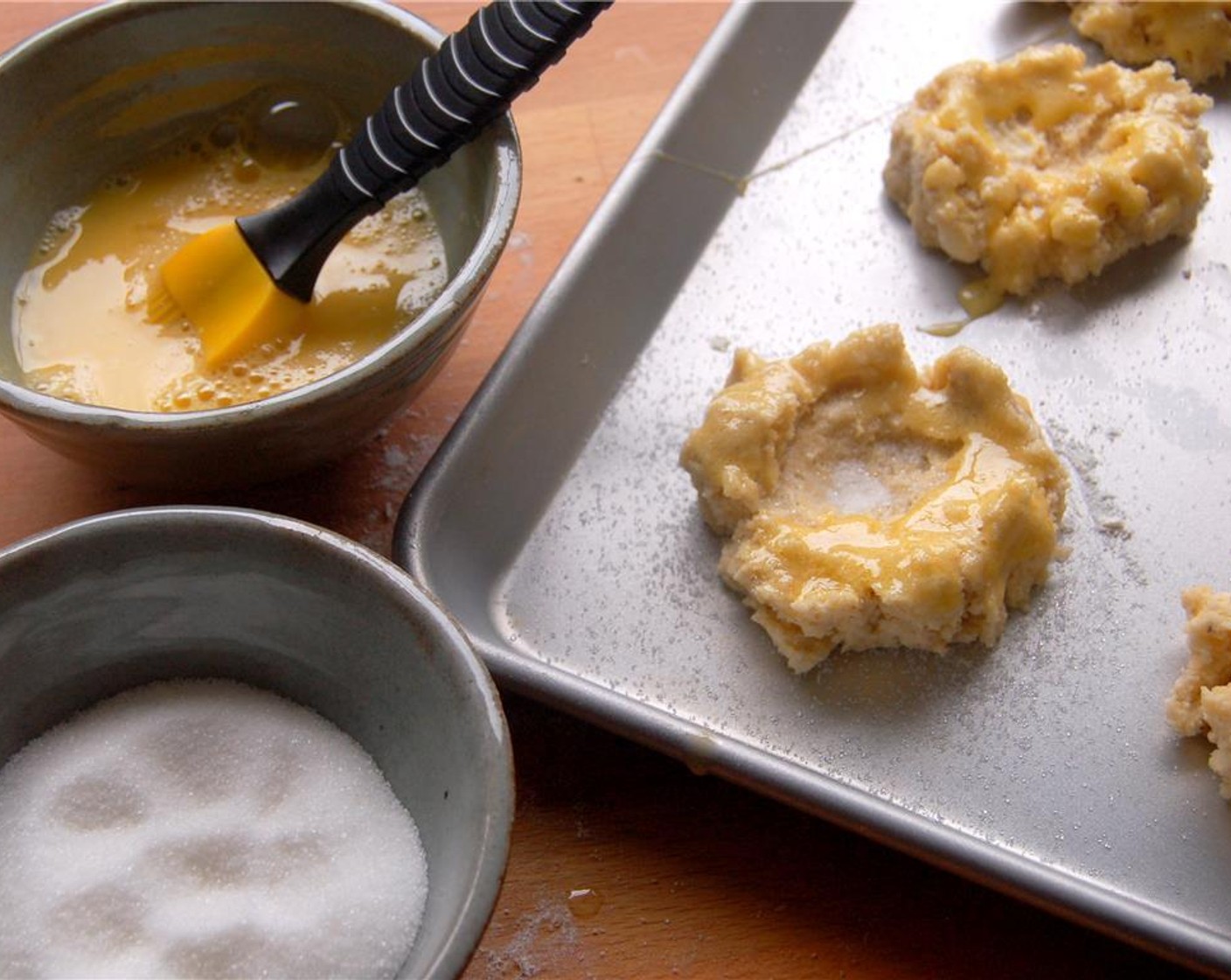 step 8 After chilling, beat an Egg (1) and brush on the rim of the scones. Liberally sprinkle with extra Granulated Sugar (to taste).