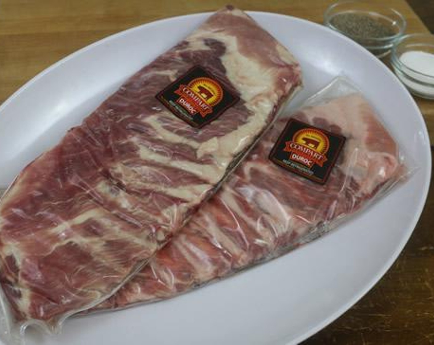 step 2 Remove the St. Louis Spare Ribs (2 racks) from packaging, trim excess fat and remove membrane from bone side.