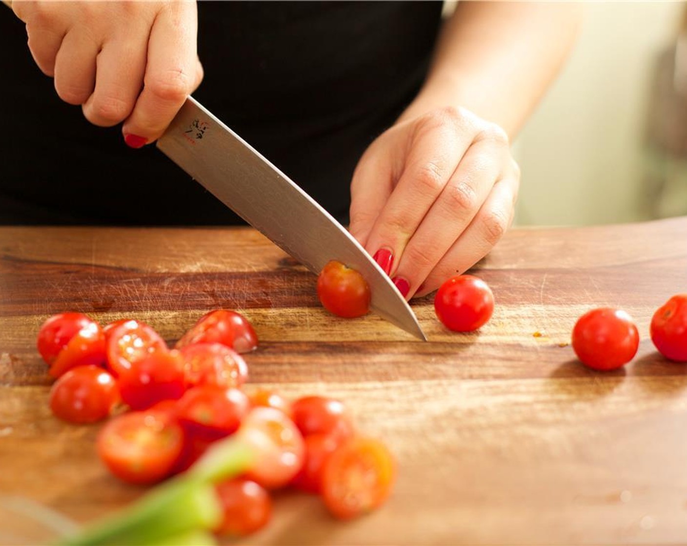 step 4 Cut the Cherry Tomato (1 cup) in half. Place in another medium bowl.