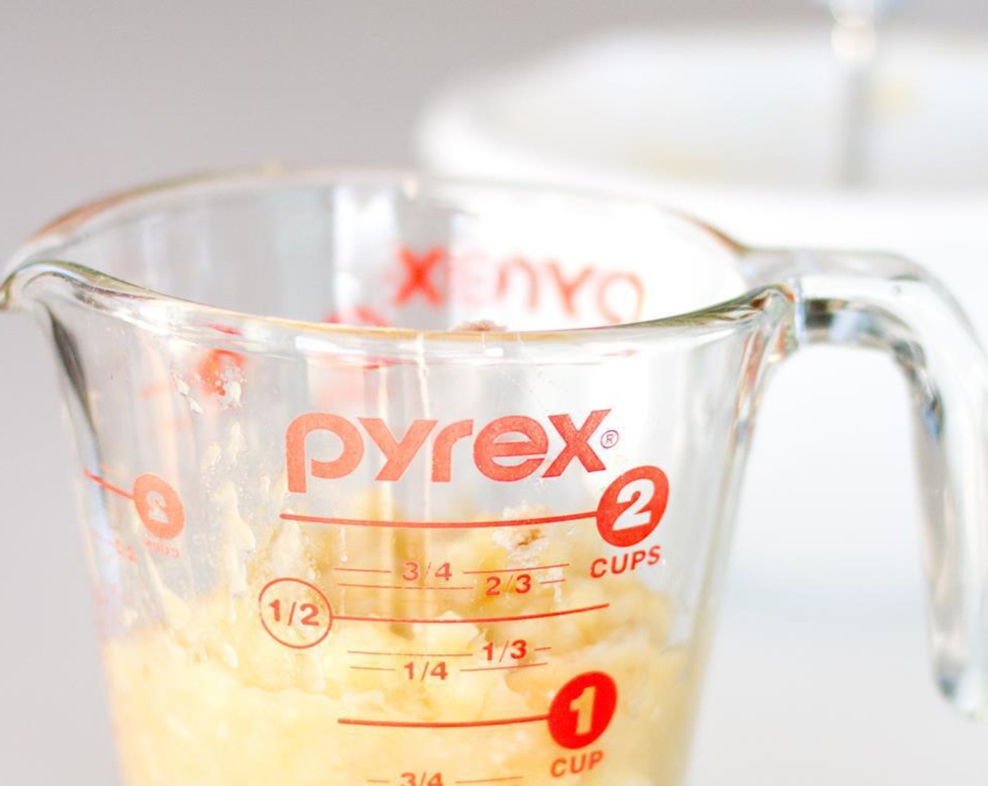 step 4 In a small cup, combine the juice from Lemon (1) and Milk (1/2 cup) and let rest for 2 minutes until it curdles.
