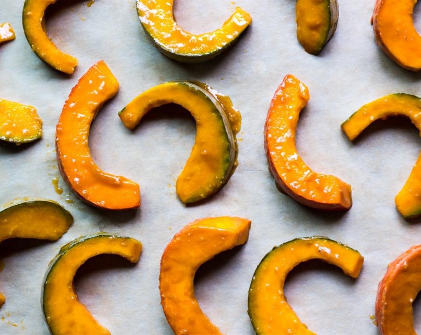 step 3 Toss Kabocha Squash (1) de-seeded and sliced into 1/2 inch slices in sauce, making sure to evenly coat each slice.