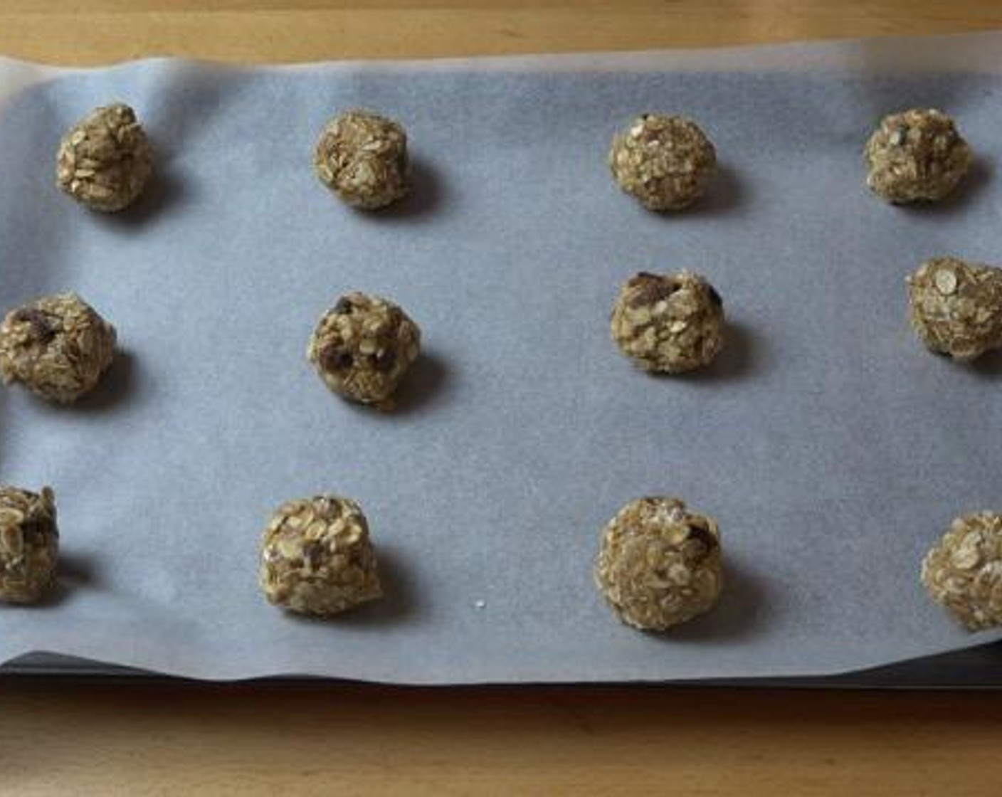 step 4 Take tablespoons of the mixture and form it into a bowl shape, and place each of the balls onto a baking tray. Bake under 350 degrees F (180 degrees C) for about 12 minutes.