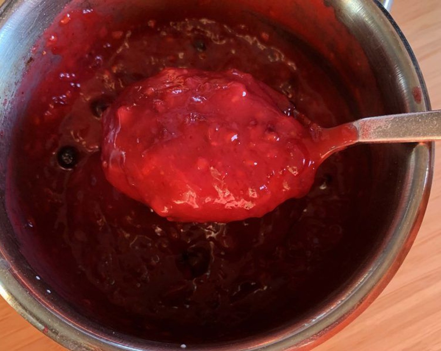 step 9 Add the blended berries to the saucepan and bring to a gentle boil. As soon as the mixture starts to thicken, remove from the heat.