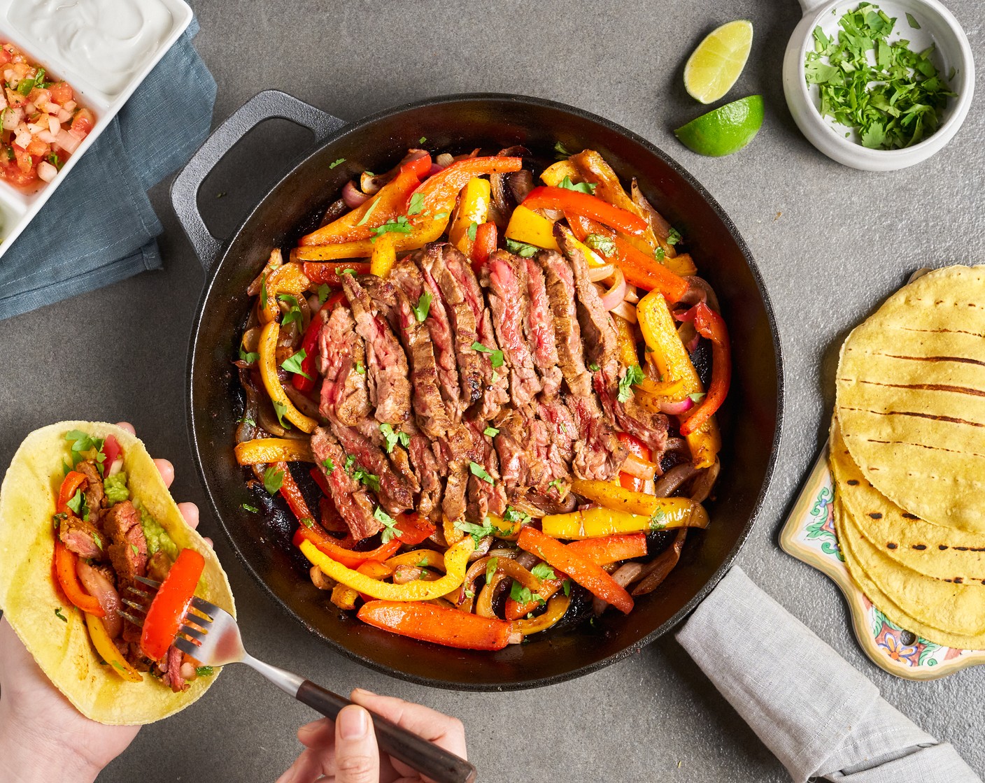 step 10 Garnish with Fresh Cilantro (1/4 bunch). Serve hot along with Small Corn Tortillas (12), Guacamole (1 cup), Pico de Gallo (1 cup), Sour Cream (1 cup), and Lime (1) on the side.