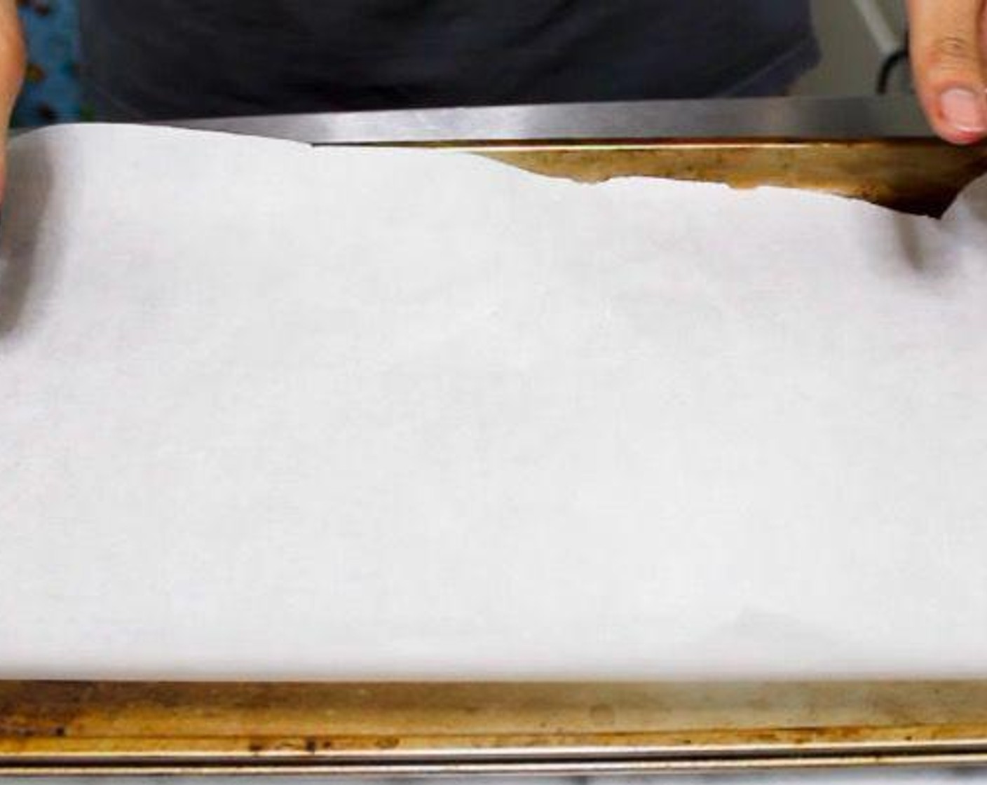 step 2 Line a couple of baking sheets with parchment paper.
