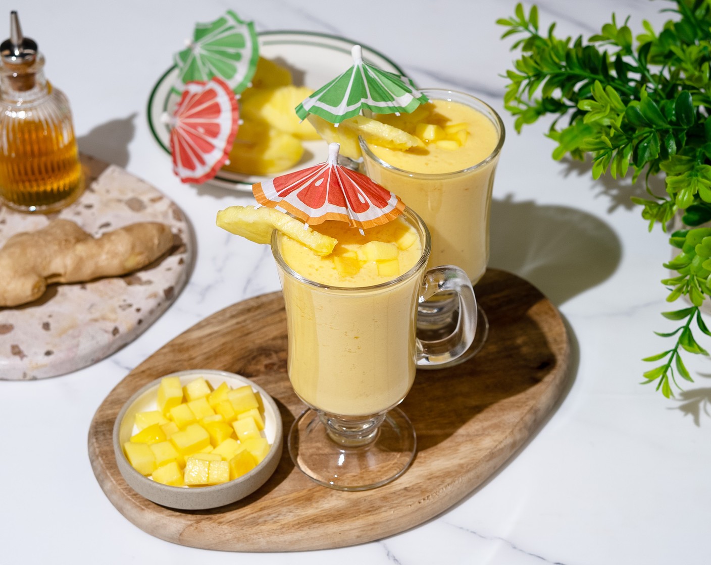 step 2 Pour into the serving glass. Optionally garnish with Fresh Mango Chunks (to taste), Pineapples (to taste) wedge, and other decorations, then serve.