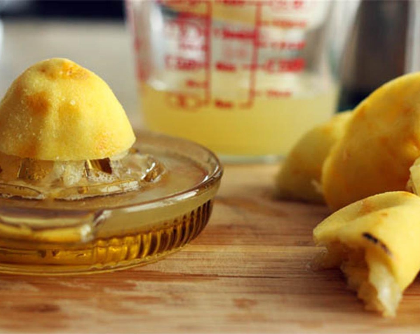 step 3 While the simple syrup cools, juice the lemon and strain to remove all the seeds and the pulp.