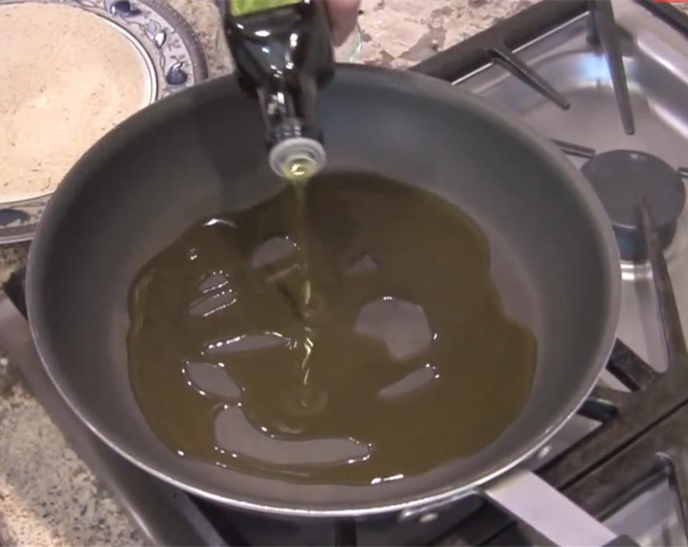 step 2 Heat Olive Oil (3 Tbsp) in a large frying pan over medium heat.