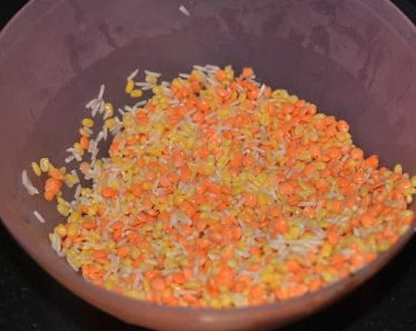 step 1 Wash and rinse Mung Beans (1 cup), Red Lentils (1 cup), and White Rice (1 cup) together. Soak for 15 minutes in water, then drain and keep aside.