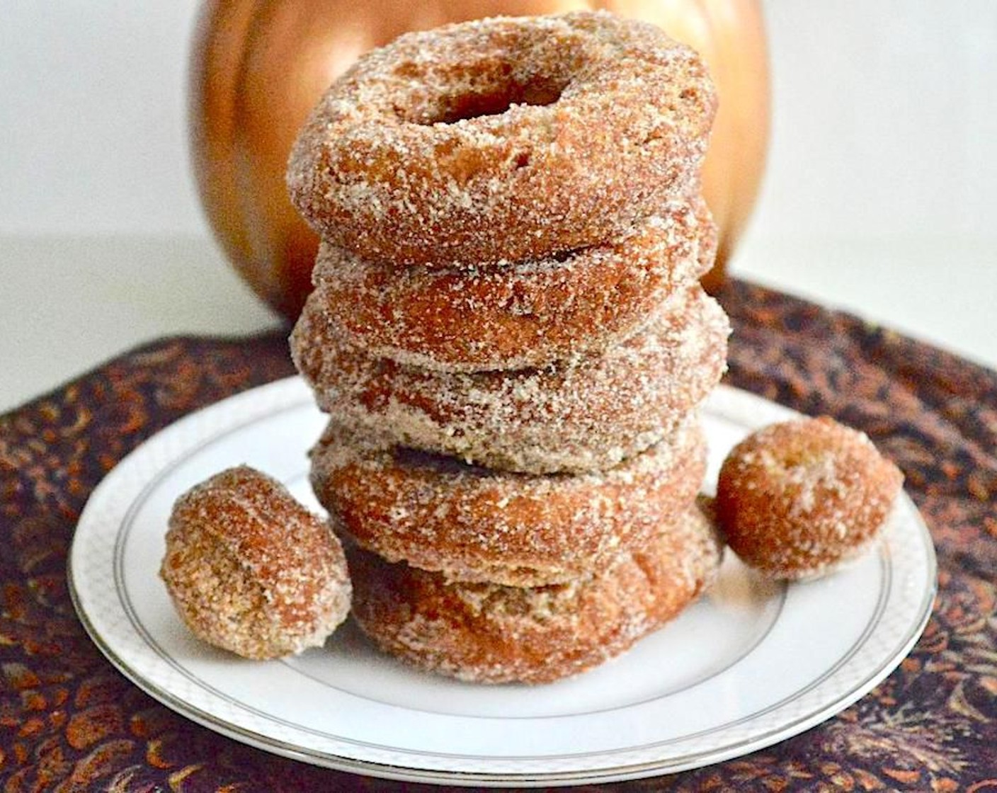 step 10 When the donuts are all fried, coat them all in the Granulated Sugar (1 cup) and Pumpkin Pie Spice (1/2 Tbsp). Serve immediately warm, enjoy!