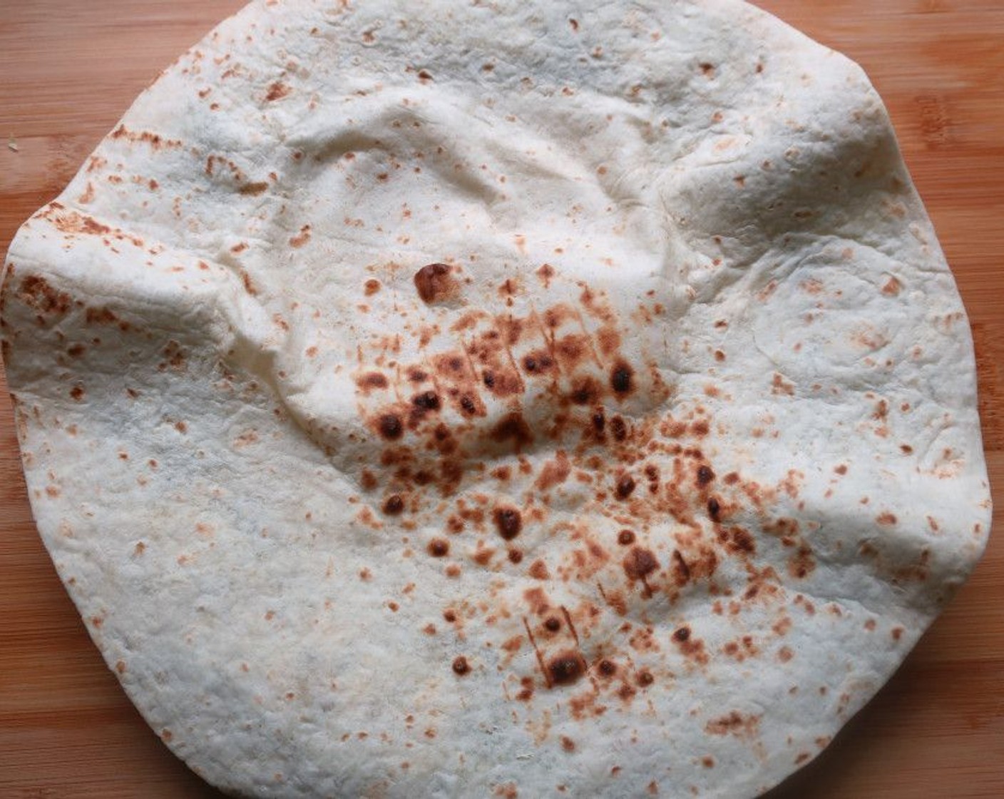 step 2 Toast or griddle the Large Flour Tortillas (2).