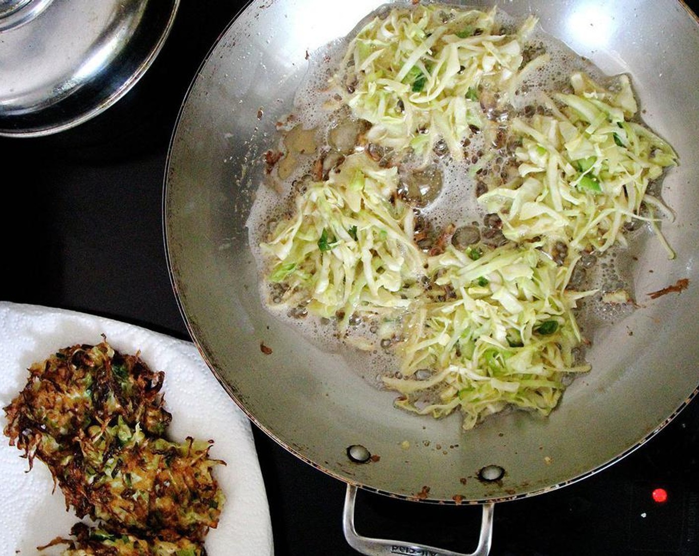 step 4 In a large sauté pan, warm Canola Oil (as needed) (I used about 2 Tbsp) over medium-high heat until glistening. Pinch the batter with your hands and carefully drop the mounds into the oil. Lower the heat to medium. Cook on each side for about 3 minutes or until golden brown.