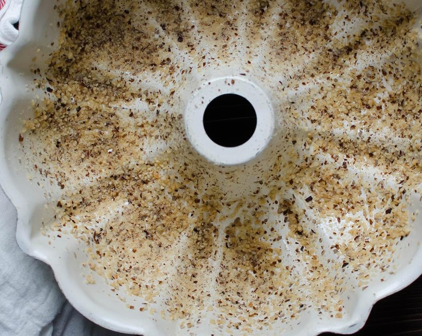 step 3 Spray a pan with Nonstick Cooking Spray (as needed). Add the pecan crumbs to the pan and dust all sides.