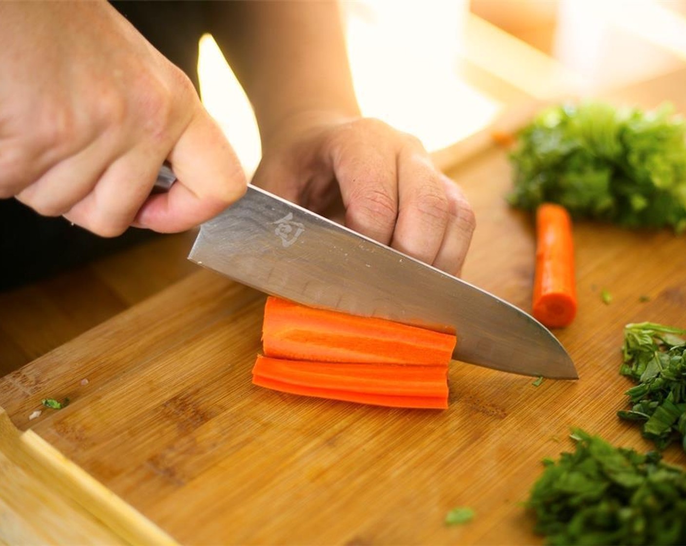 step 4 Peel the Carrot (1) and cut in half. Slice into quarter inch thick slices. Next, lay slices stacked on cutting board and slice quarter inch thick slices to create sticks. Do not peel the Persian Cucumber (1) and repeat same slicing process as the carrots. Plate next to carrot sticks.