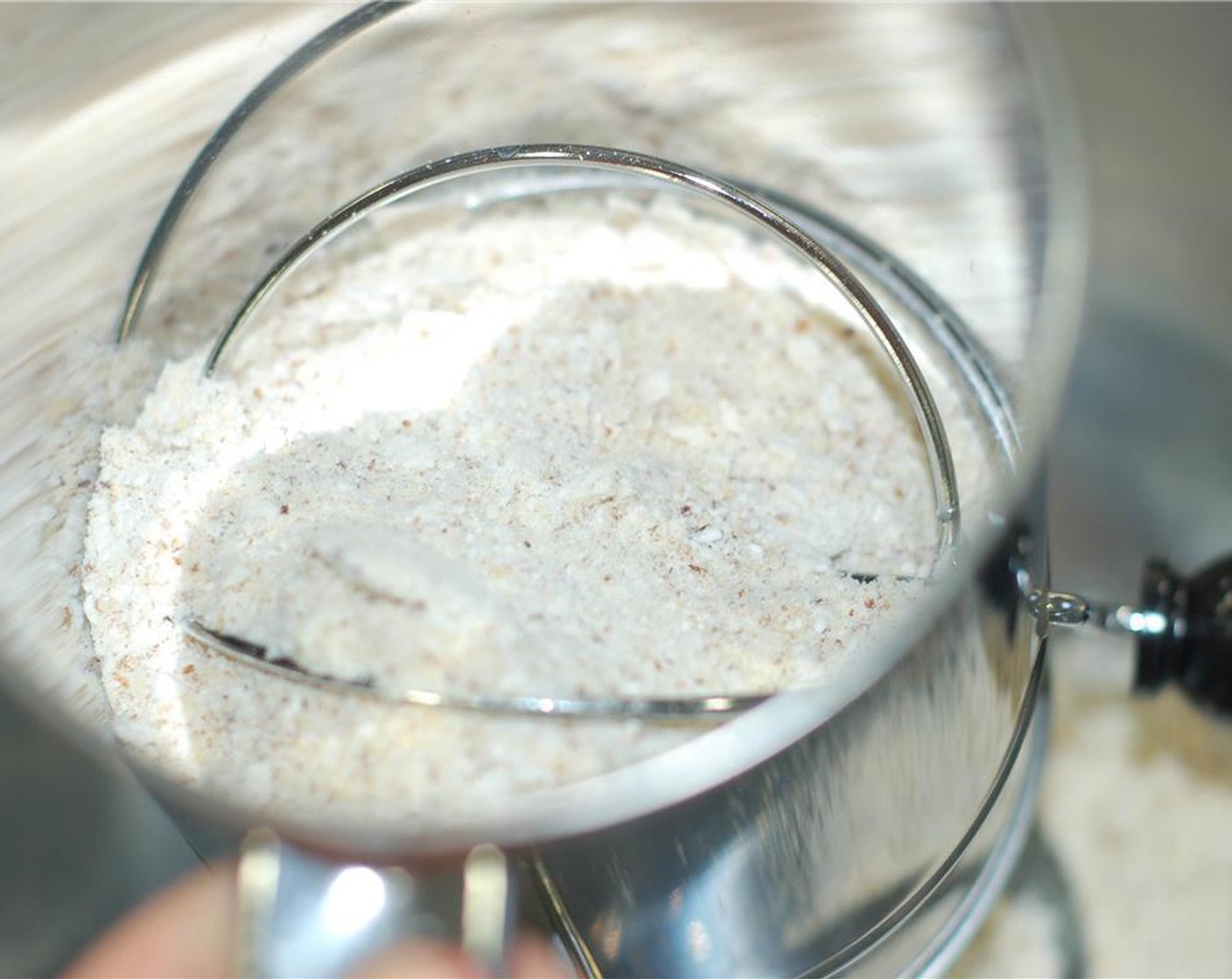 step 3 Sift the hazelnut flour mixture twice, and sift the remaining Powdered Confectioners Sugar (1 cup) twice.