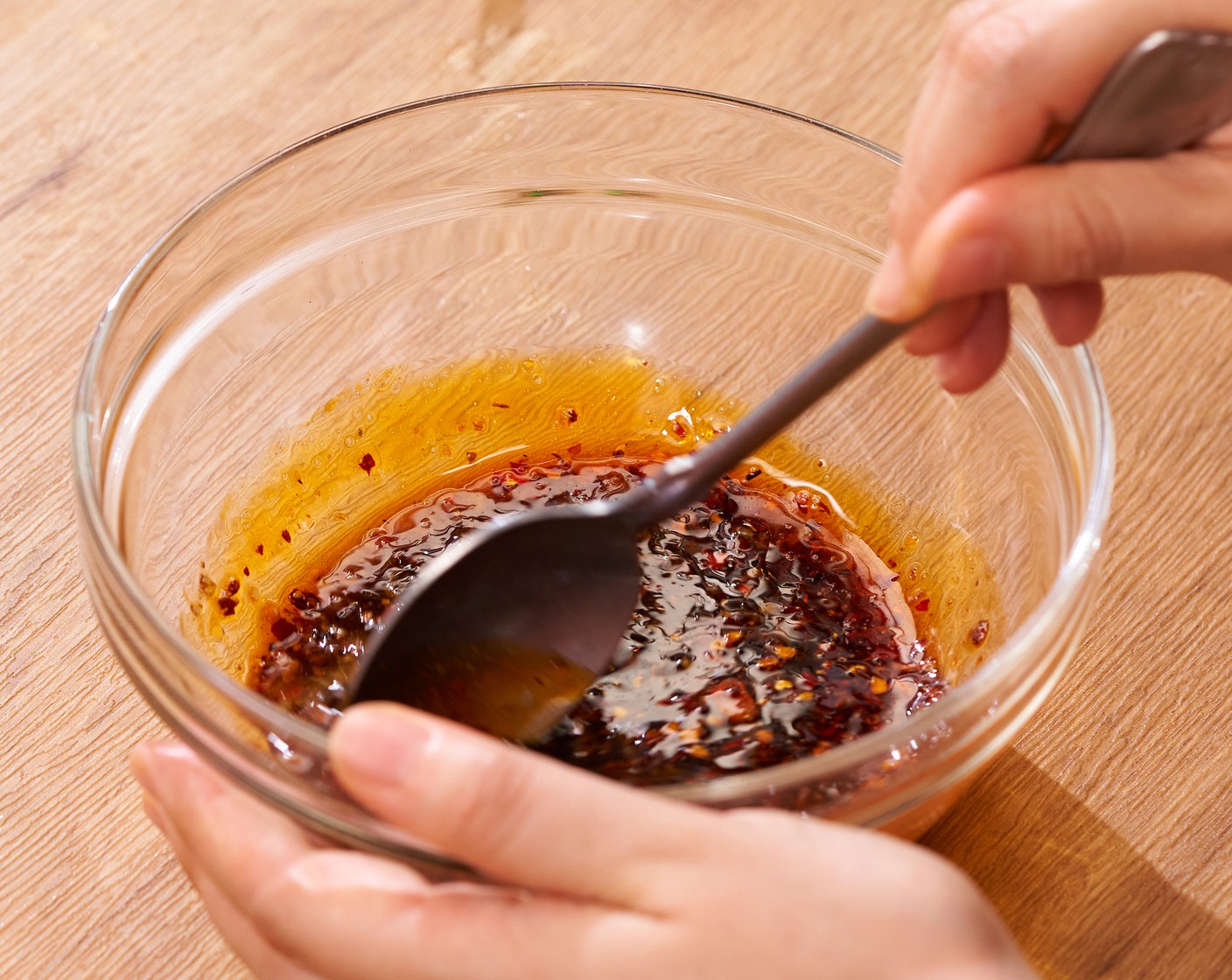 step 3 In a small mixing bowl, add Jarred Minced Garlic in Water (3 Tbsp), Sichuan Peppercorn Oil (1 Tbsp), Black Vinegar (2 Tbsp), Light Soy Sauce (2 Tbsp), Sesame Oil (1 tsp), and Granulated Sugar (1 tsp). Mix until well combined and adjust the taste to your preference.